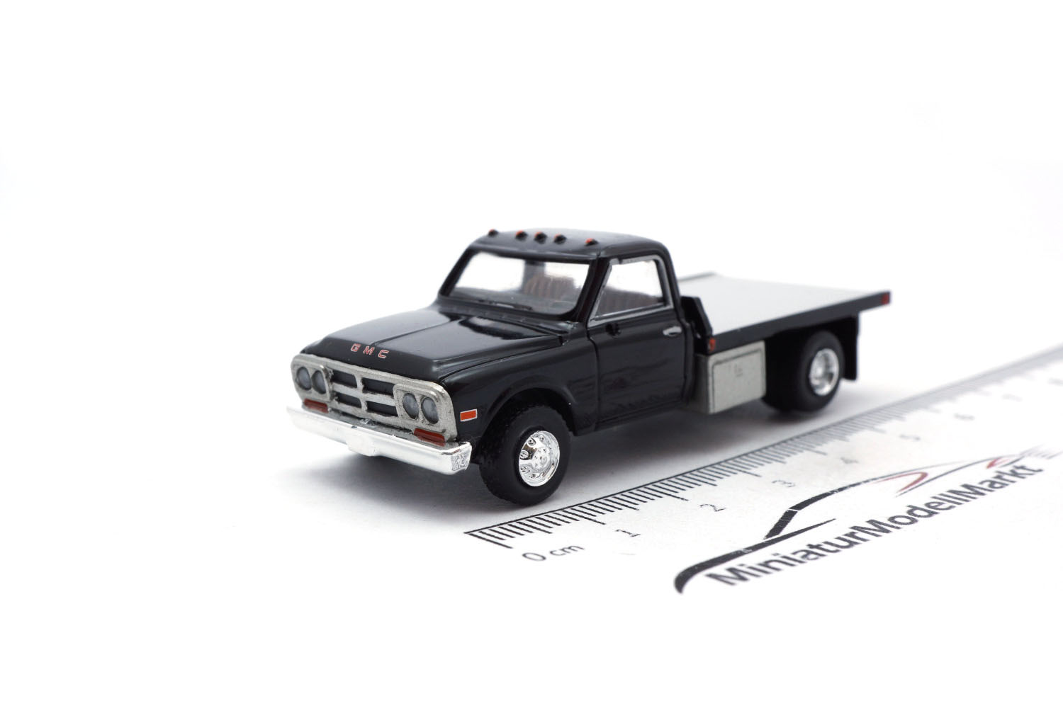 Brekina BRE19669 GMC Sierra Grande Plattform - schwarz 1:87
