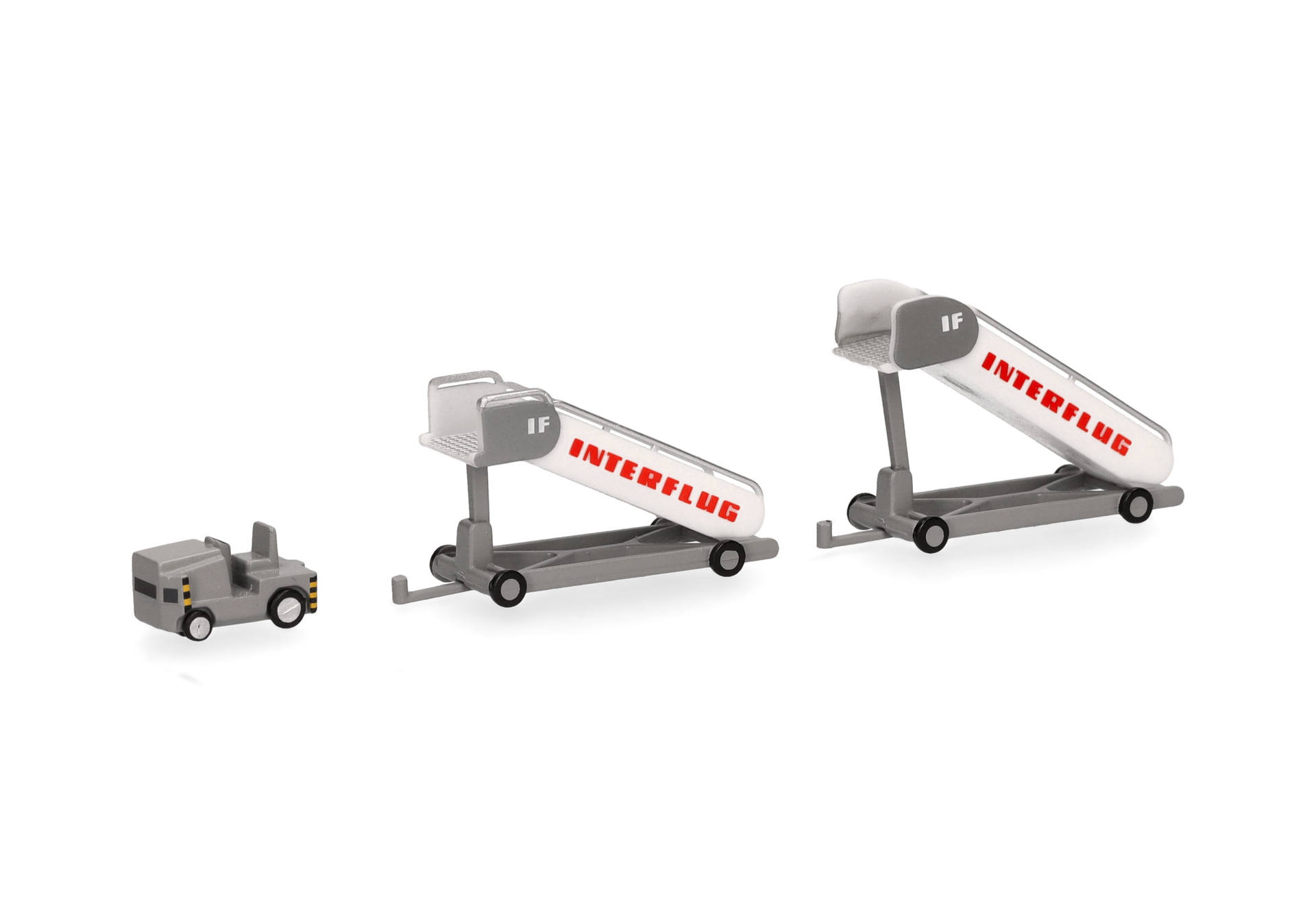 Herpa 573153 Interflug historische Fluggasttreppen (2x) mit Zugfahrzeug (1x) 1:200