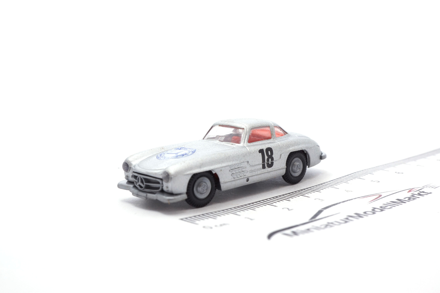 Praline 82508-06 Mercedes-Benz 300 SL - Silber #18 Mercedes Logo 1:87