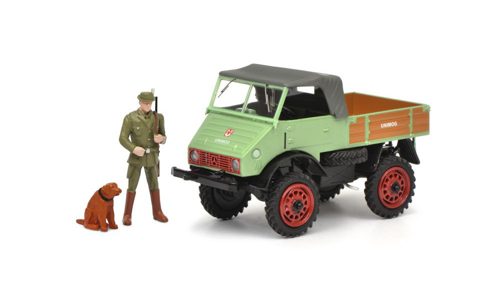 Schuco 450254800 Mercedes-Benz Unimog 401 grün mit Jäger und Hund  1:43