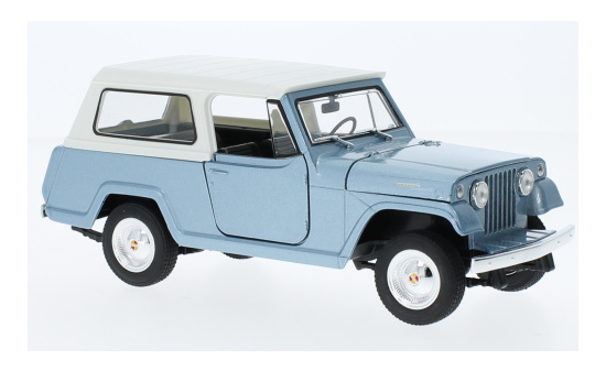 Welly WEL24117H-BLUE Jeep Jeepster Commando - hellblau (Metallic) - Vorbestellung 1:24